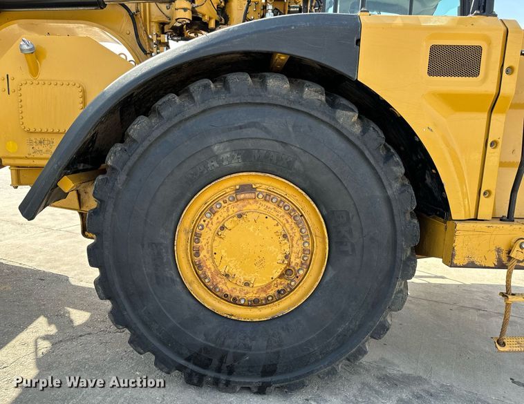 image for item DL4402 2014 Caterpillar 627K conventional scraper 