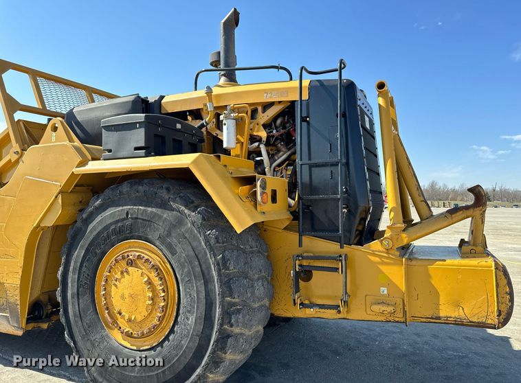 image for item DL4403 2014 Caterpillar 627K conventional scraper 