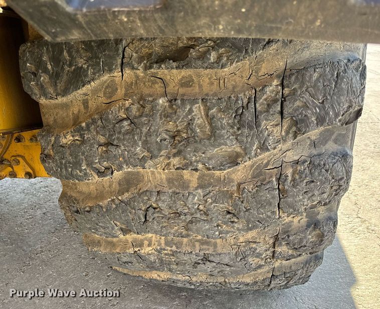 image for item DL4403 2014 Caterpillar 627K conventional scraper 