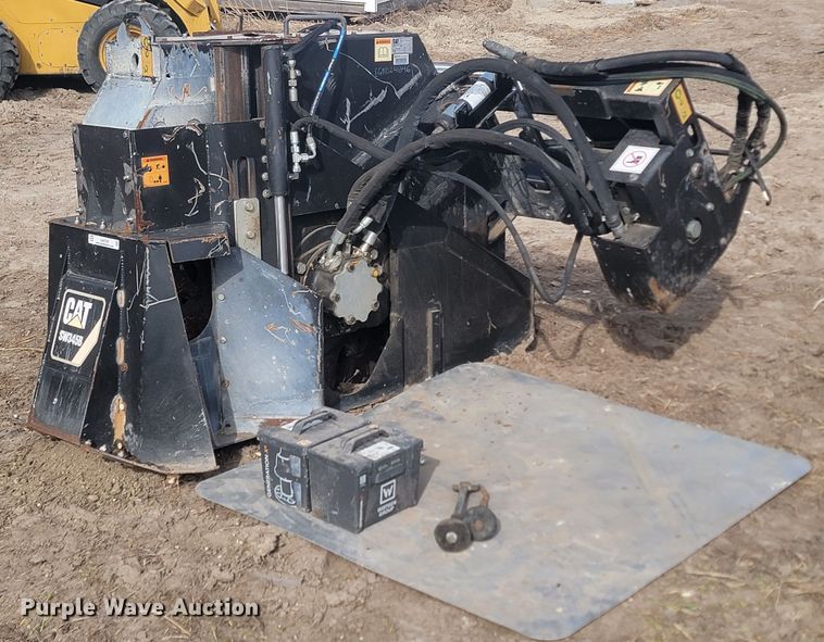 image for item LA9729 2015 Caterpillar SW345B skid steer rock saw