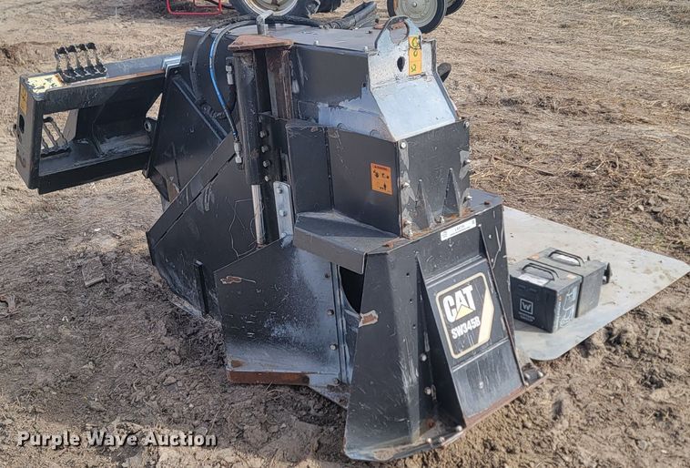 image for item LA9729 2015 Caterpillar SW345B skid steer rock saw