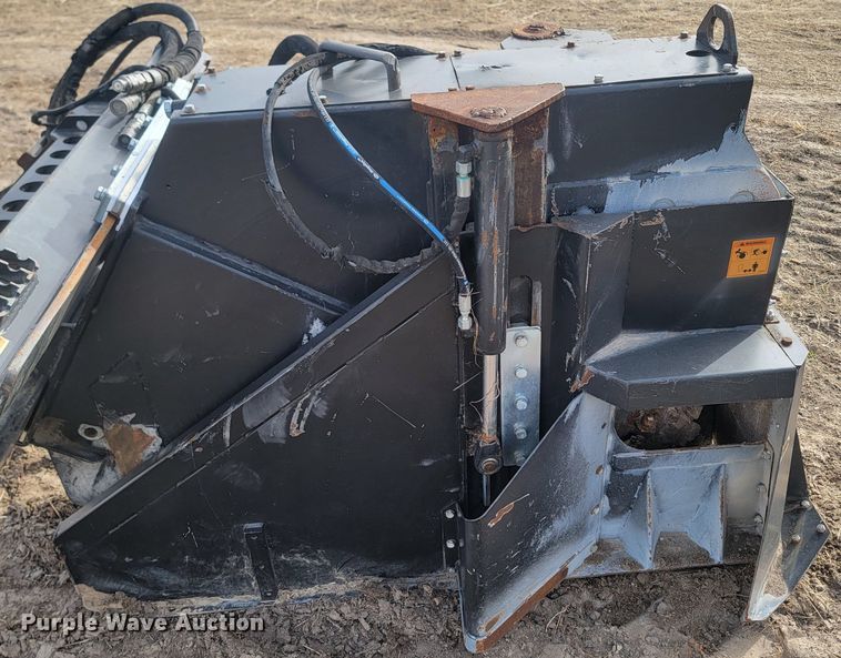 image for item LA9729 2015 Caterpillar SW345B skid steer rock saw