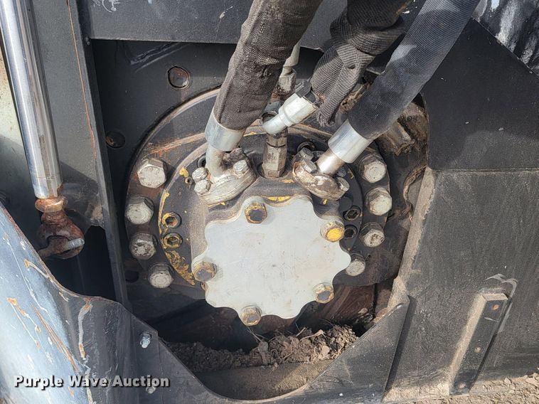 image for item LA9729 2015 Caterpillar SW345B skid steer rock saw