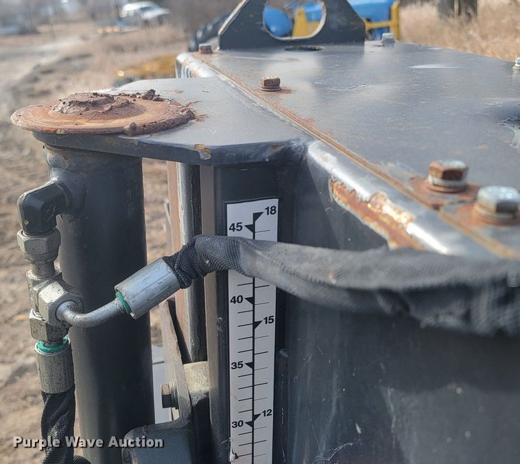 image for item LA9729 2015 Caterpillar SW345B skid steer rock saw