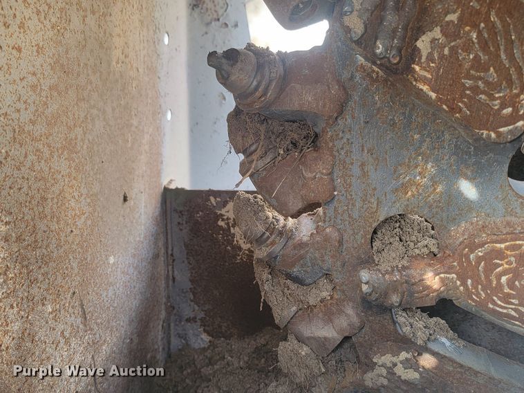 image for item LA9729 2015 Caterpillar SW345B skid steer rock saw