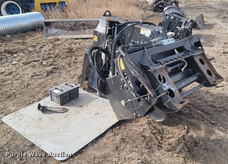 image for item LA9729 2015 Caterpillar SW345B skid steer rock saw