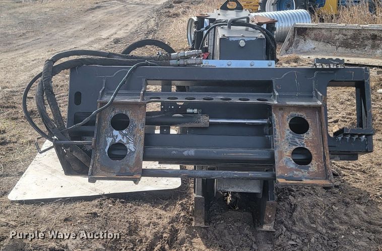 image for item LA9729 2015 Caterpillar SW345B skid steer rock saw