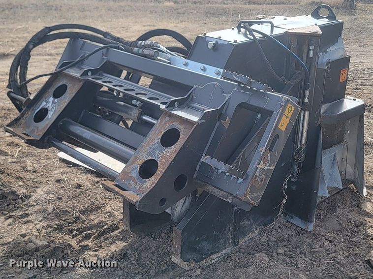 image for item LA9729 2015 Caterpillar SW345B skid steer rock saw