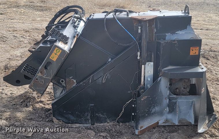 image for item LA9729 2015 Caterpillar SW345B skid steer rock saw