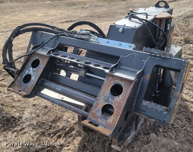 image for item LA9729 2015 Caterpillar SW345B skid steer rock saw