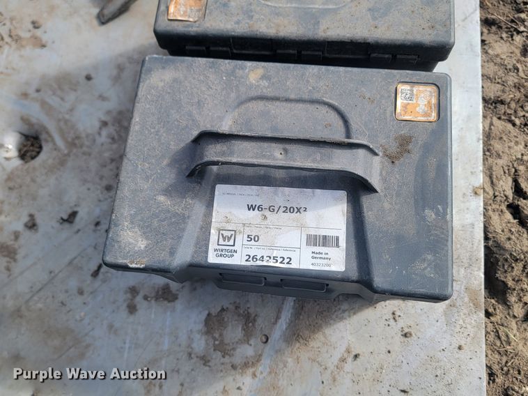 image for item LA9729 2015 Caterpillar SW345B skid steer rock saw