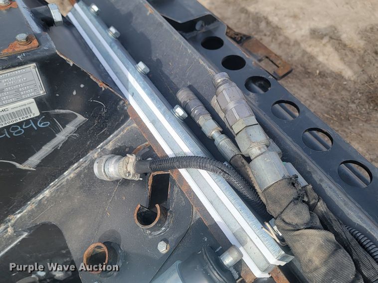 image for item LA9729 2015 Caterpillar SW345B skid steer rock saw