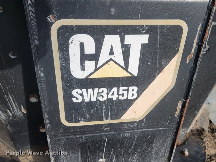 image for item LA9729 2015 Caterpillar SW345B skid steer rock saw