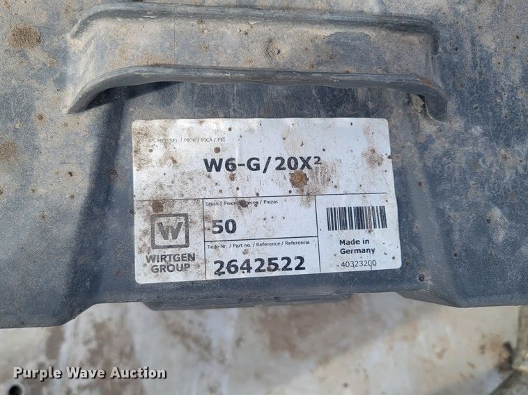 image for item LA9729 2015 Caterpillar SW345B skid steer rock saw