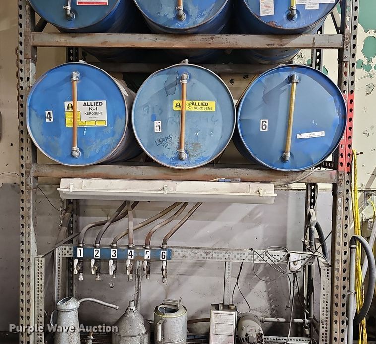 (6) barrel fluid rack in Kansas City, KS | Item EK5683 sold | Purple Wave