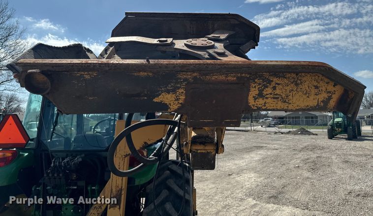 image for item ND9083 2015 John Deere 6115D MFWD tractor