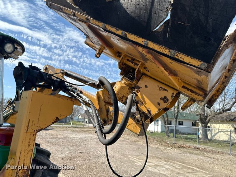 image for item ND9083 2015 John Deere 6115D MFWD tractor