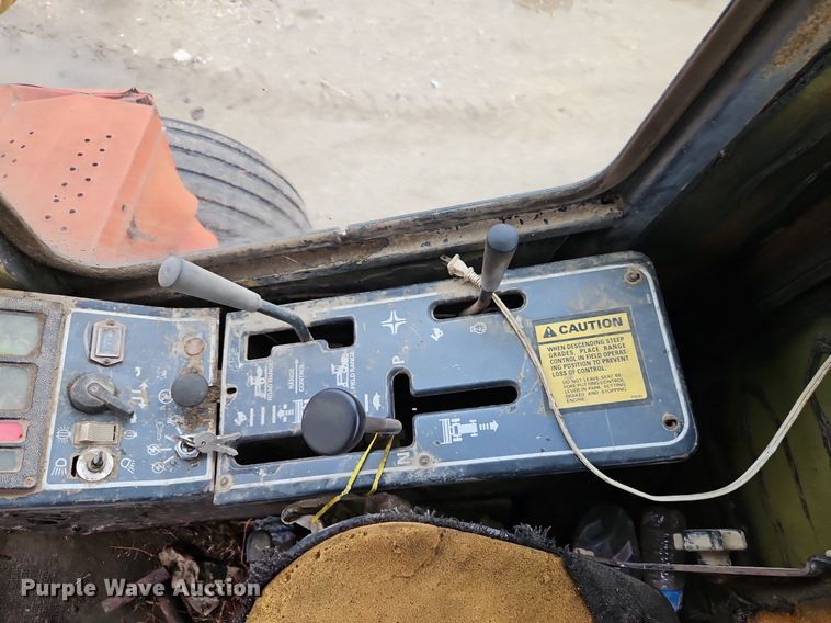 image for item DR8540 1982 New Holland 1116 swather / windrower