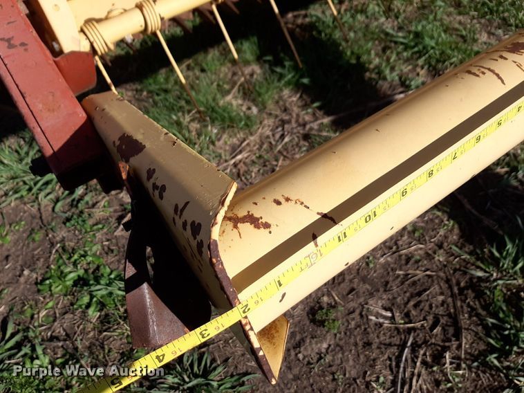 image for item DV9936 New Holland  116 swather / windrower