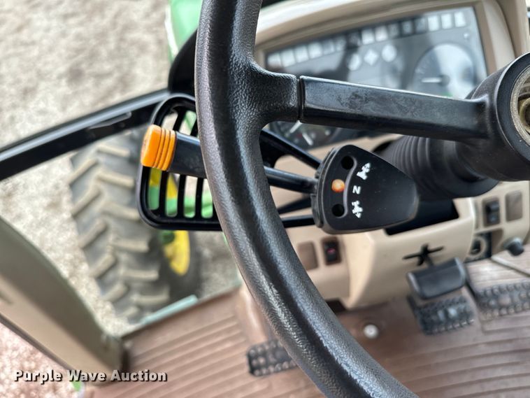 image for item EG1316 2003 John Deere 6415 MFWD tractor