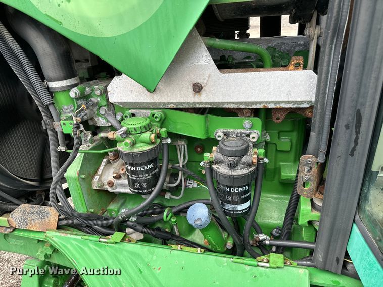 image for item EG1316 2003 John Deere 6415 MFWD tractor