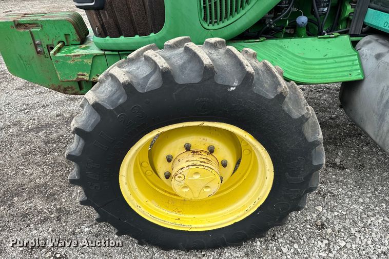 image for item EG1316 2003 John Deere 6415 MFWD tractor