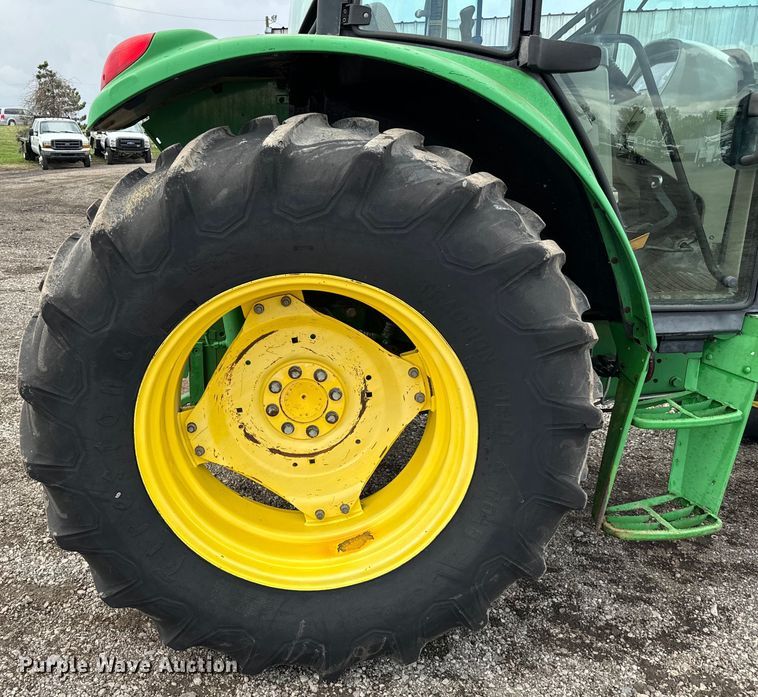 image for item EG1316 2003 John Deere 6415 MFWD tractor