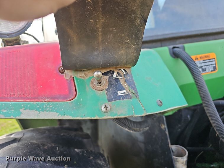 image for item EJ6172 1994 John Deere 7400 MFWD tractor