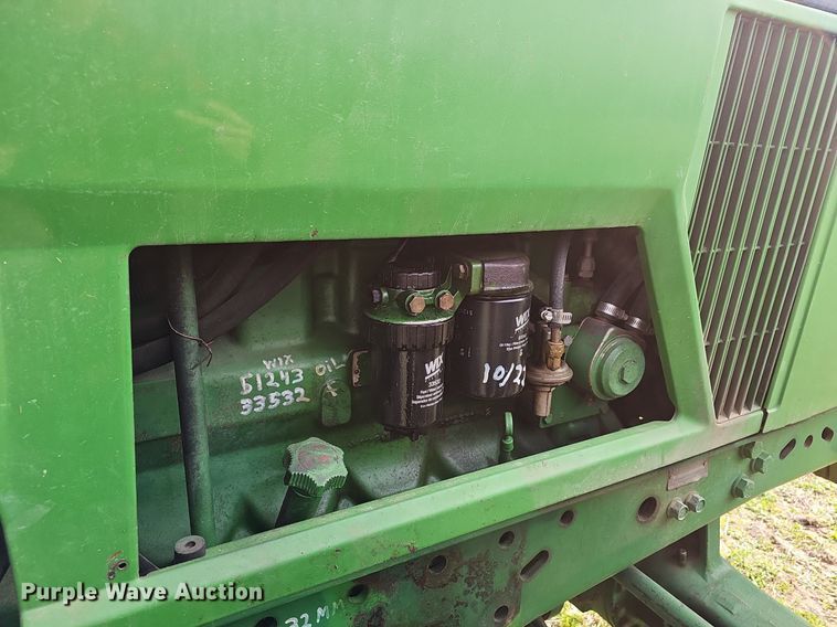 image for item EJ6172 1994 John Deere 7400 MFWD tractor