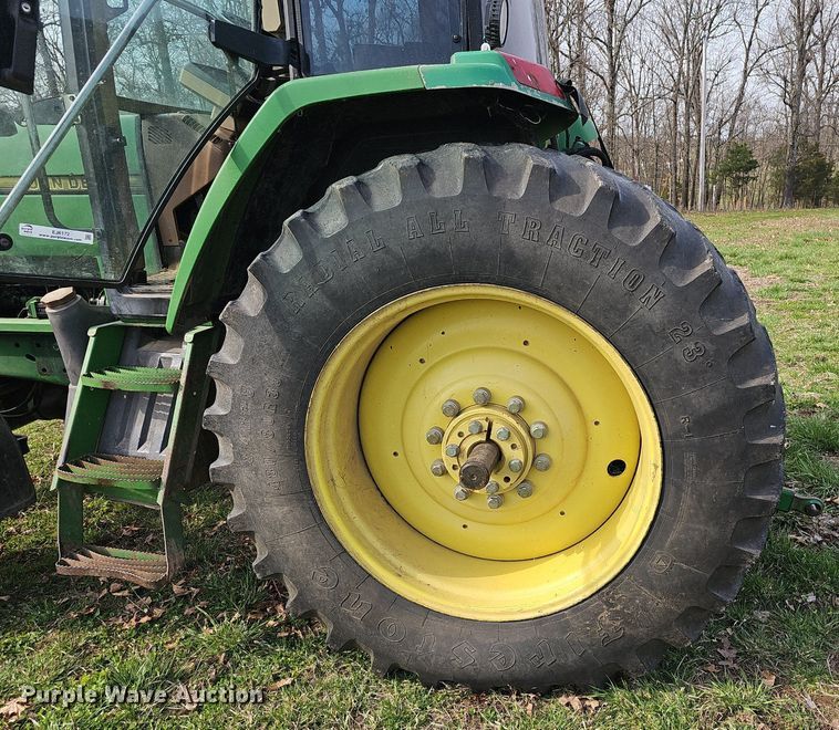 image for item EJ6172 1994 John Deere 7400 MFWD tractor