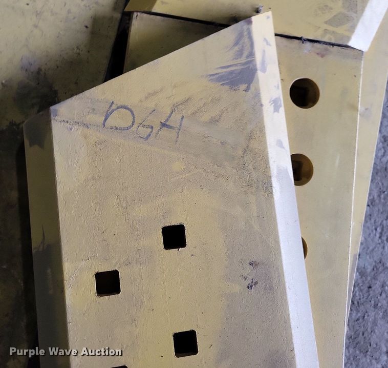 image for item DG0569 Approximately 26 Caterpillar cutting edges