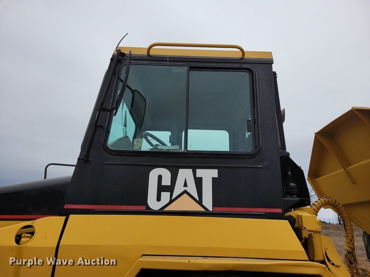 image for item DO3210 1999 Caterpillar D250E II haul truck
