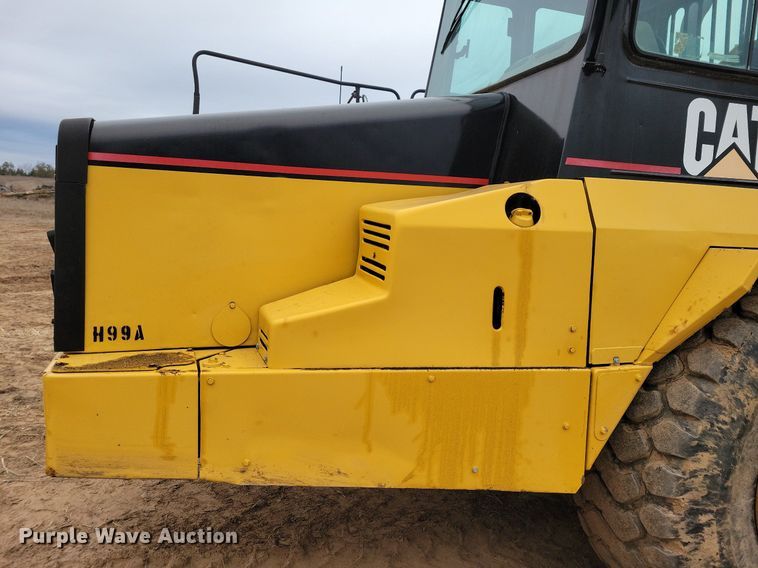 image for item DO3210 1999 Caterpillar D250E II haul truck