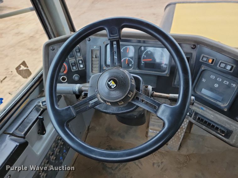 image for item DO3210 1999 Caterpillar D250E II haul truck