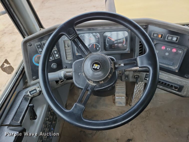 image for item DO3210 1999 Caterpillar D250E II haul truck