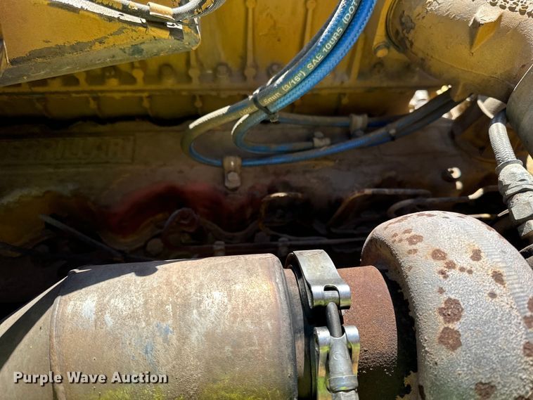 image for item DO3210 1999 Caterpillar D250E II haul truck