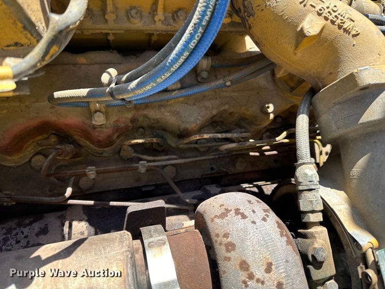 image for item DO3210 1999 Caterpillar D250E II haul truck