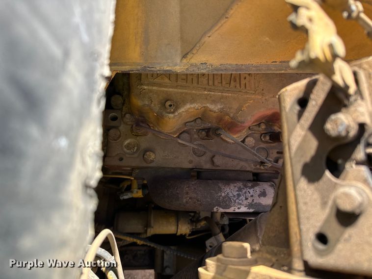 image for item DO3210 1999 Caterpillar D250E II haul truck