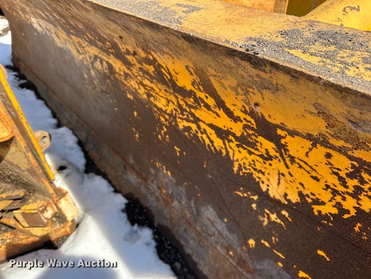 image for item DQ0667 Henke 12' W wheel loader snow plow