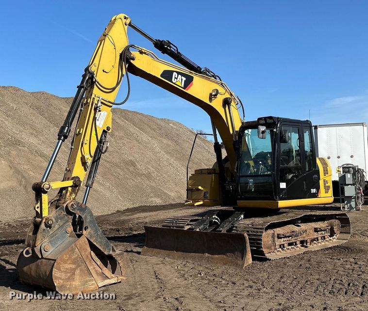 image for item DQ7439 2015 Caterpillar 311FL RR excavator