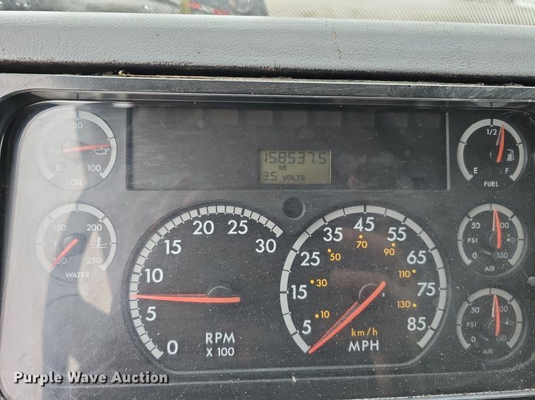 image for item DQ8640 2001 Freightliner FL70 flatbed truck