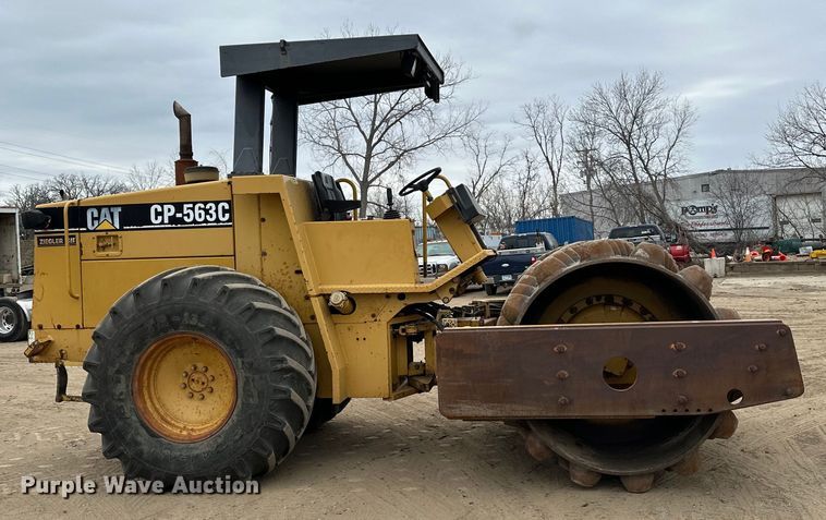 image for item DQ0599 1999 Caterpillar  CP-563C single drum vibratory roller