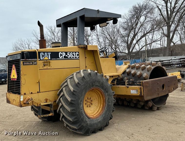 image for item DQ0599 1999 Caterpillar  CP-563C single drum vibratory roller