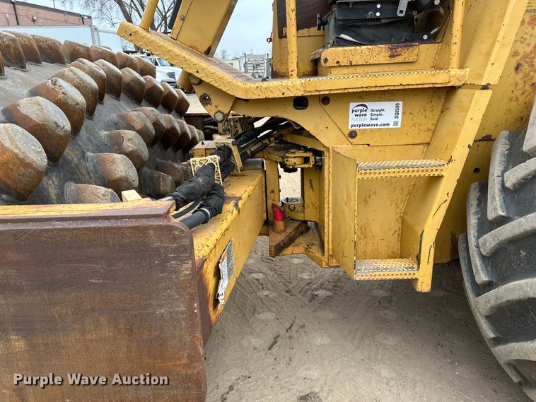 image for item DQ0599 1999 Caterpillar  CP-563C single drum vibratory roller