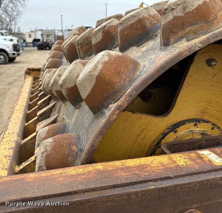 image for item DQ0599 1999 Caterpillar  CP-563C single drum vibratory roller