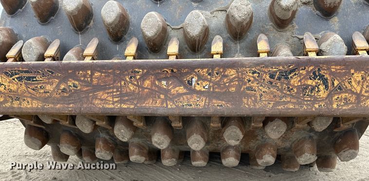 image for item DQ0599 1999 Caterpillar  CP-563C single drum vibratory roller