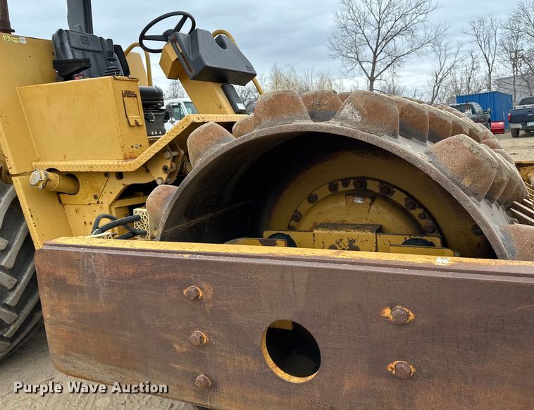 image for item DQ0599 1999 Caterpillar  CP-563C single drum vibratory roller