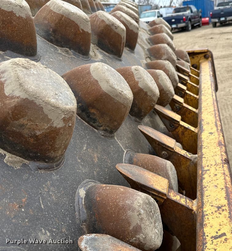 image for item DQ0599 1999 Caterpillar  CP-563C single drum vibratory roller