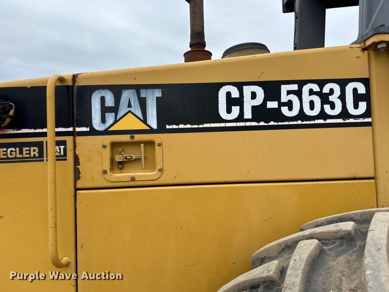 image for item DQ0599 1999 Caterpillar  CP-563C single drum vibratory roller