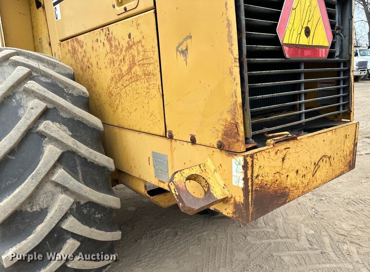 image for item DQ0599 1999 Caterpillar  CP-563C single drum vibratory roller